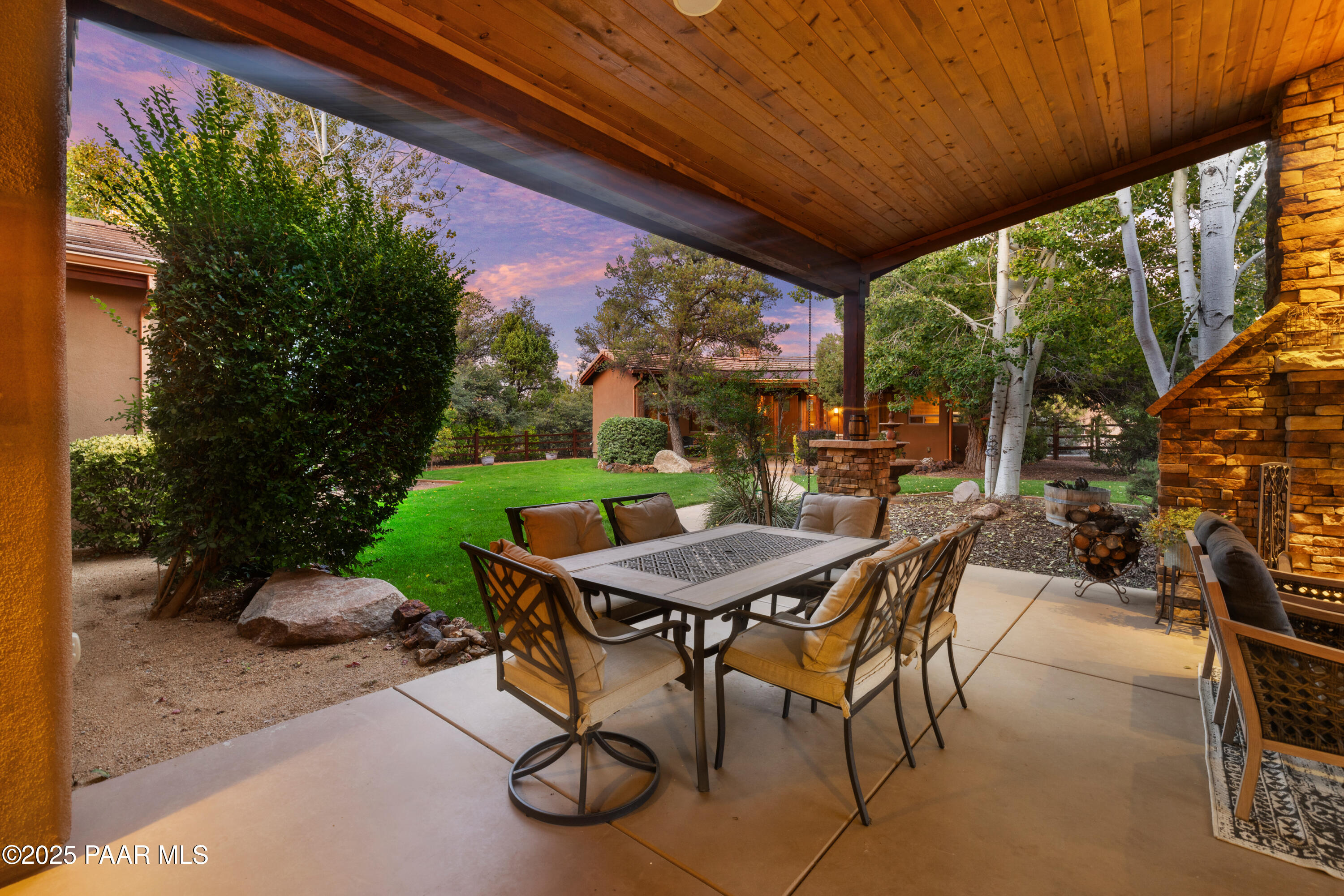 5110 Indian Camp Road Prescott, AZ 86305 - Photo 66 of 79 a table and chairs with the view of outdoor space