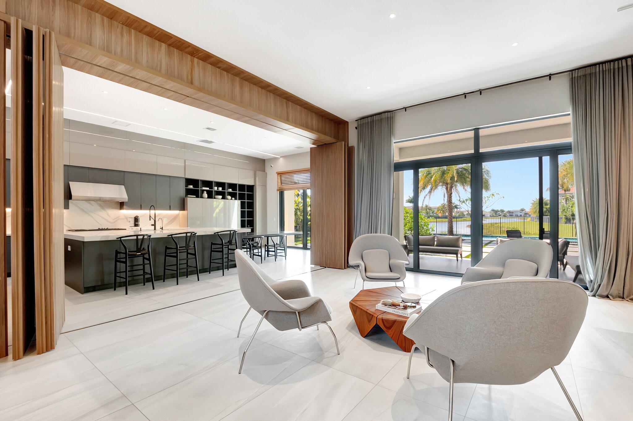 17353 Rosella Road Boca Raton, FL 33496 - Photo 14 of 103 a living room with furniture and a large window