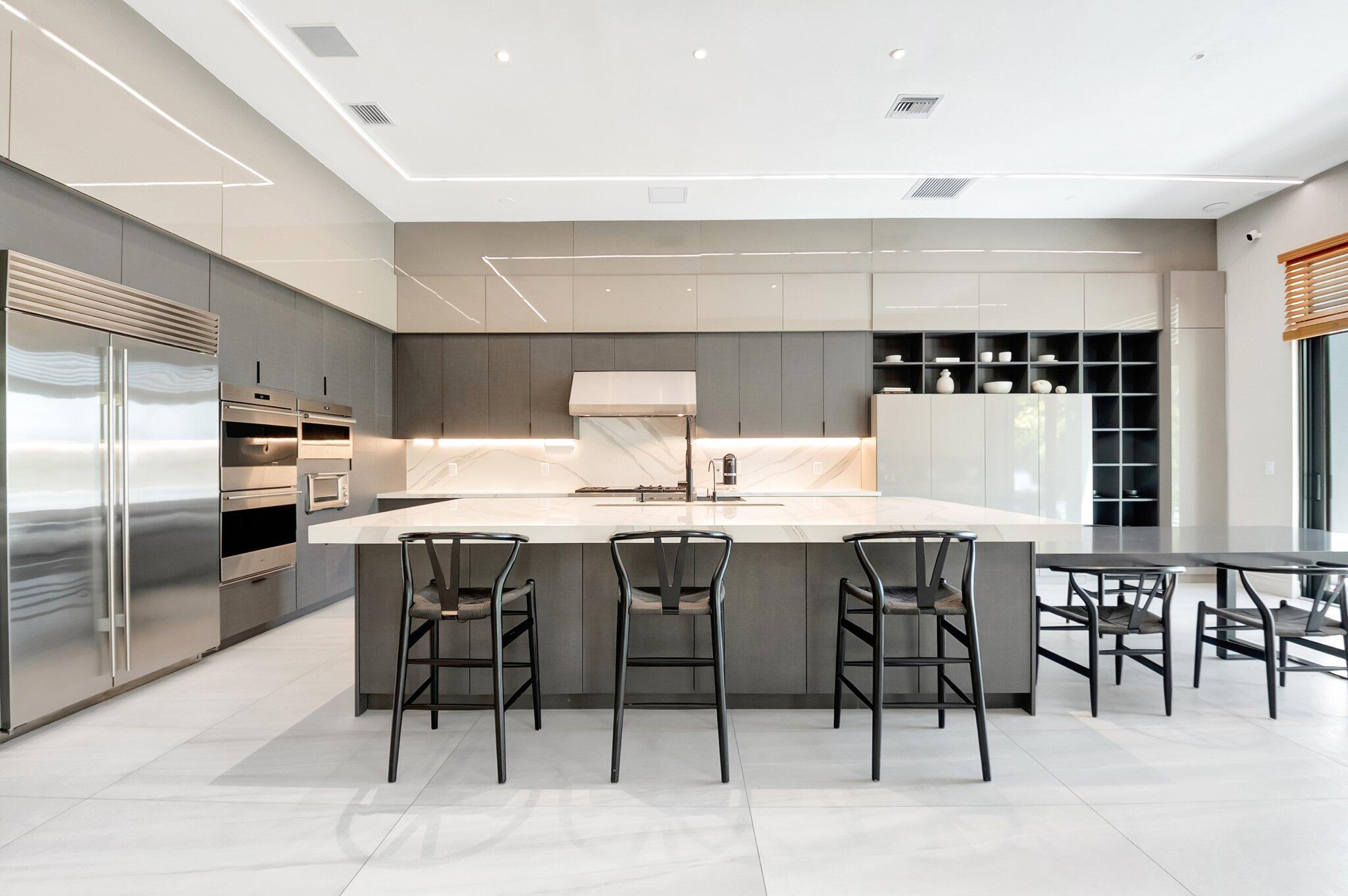 17353 Rosella Road Boca Raton, FL 33496 - Photo 15 of 103 a kitchen with a table and chairs in it