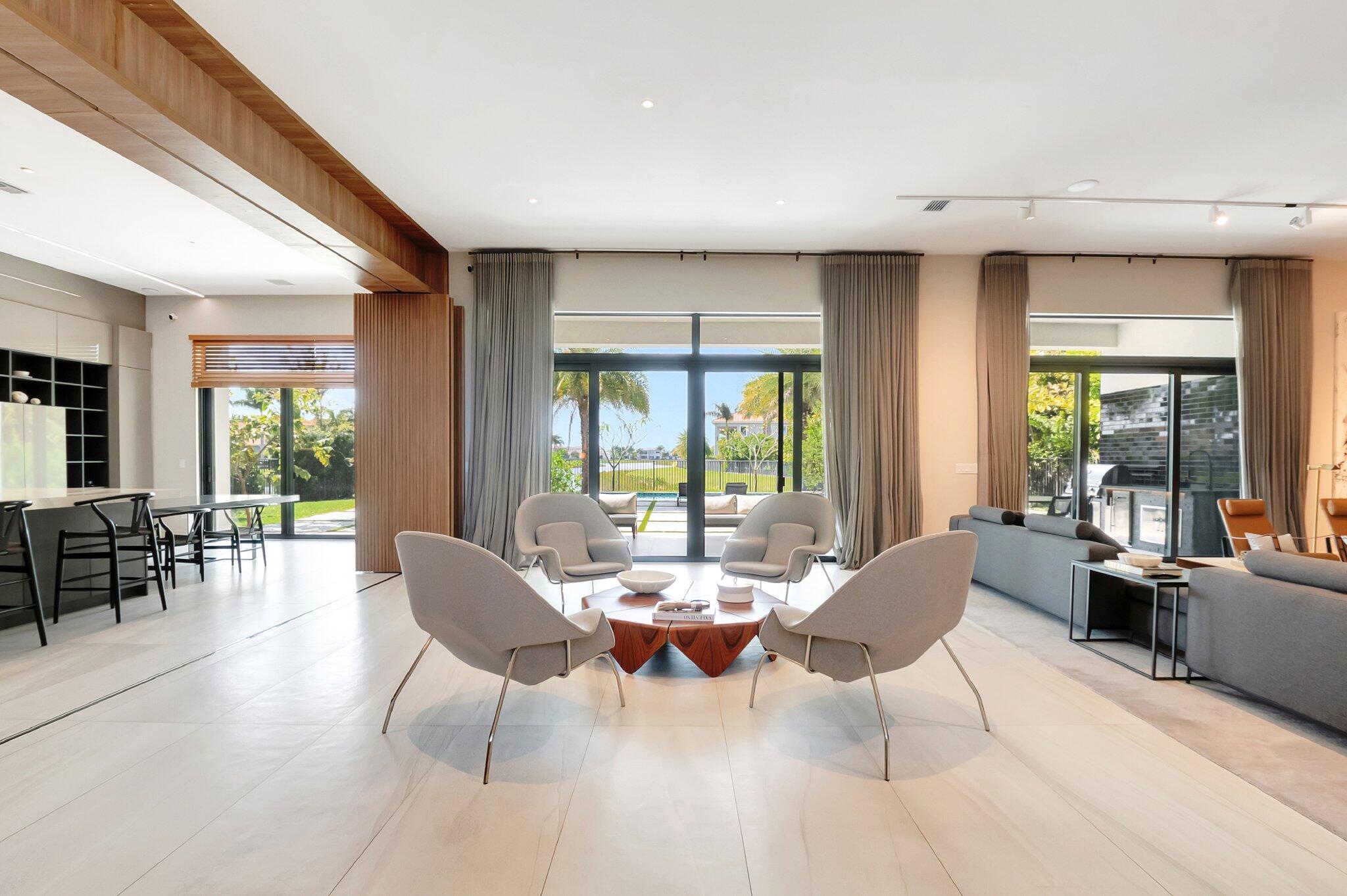 17353 Rosella Road Boca Raton, FL 33496 - Photo 31 of 103 a living room with furniture and large windows