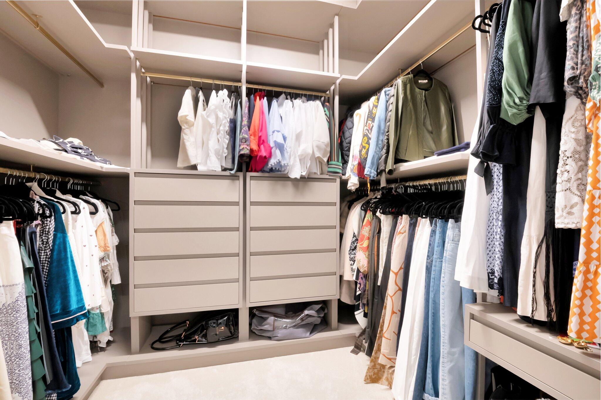 17353 Rosella Road Boca Raton, FL 33496 - Photo 43 of 103 a view of walk in closet with clothes and shoes