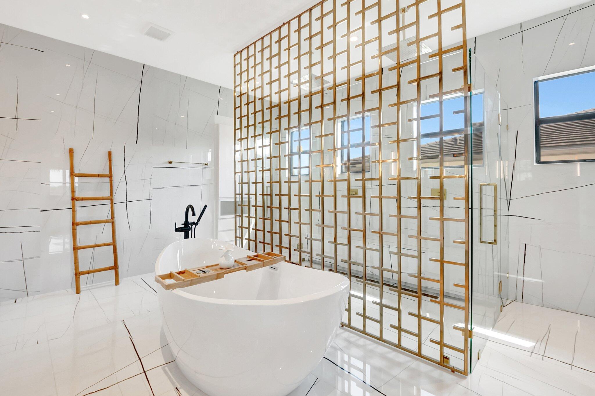 17353 Rosella Road Boca Raton, FL 33496 - Photo 47 of 103 a bathroom with a bathtub and shower