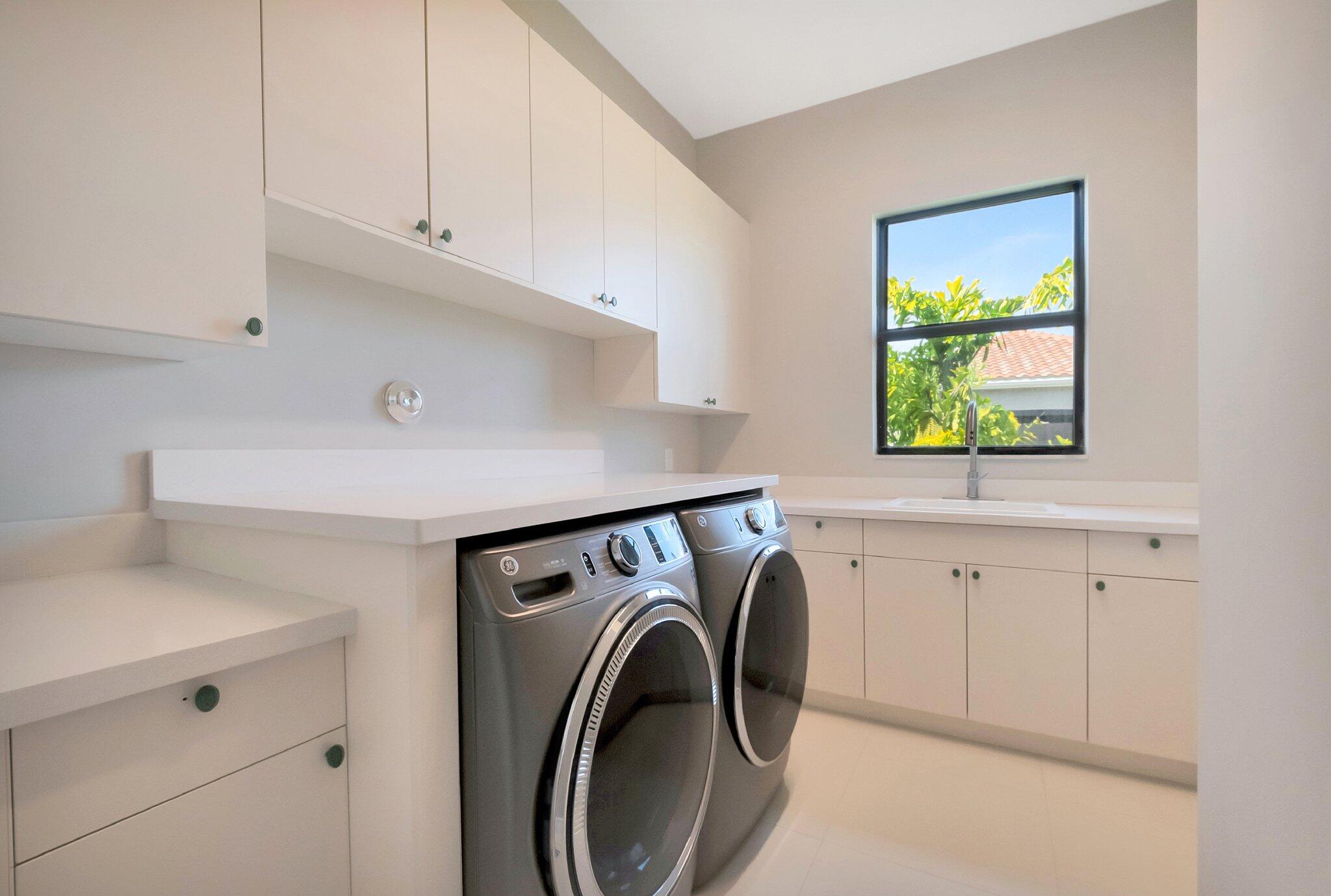 17353 Rosella Road Boca Raton, FL 33496 - Photo 60 of 103 a utility room with dryer and washer