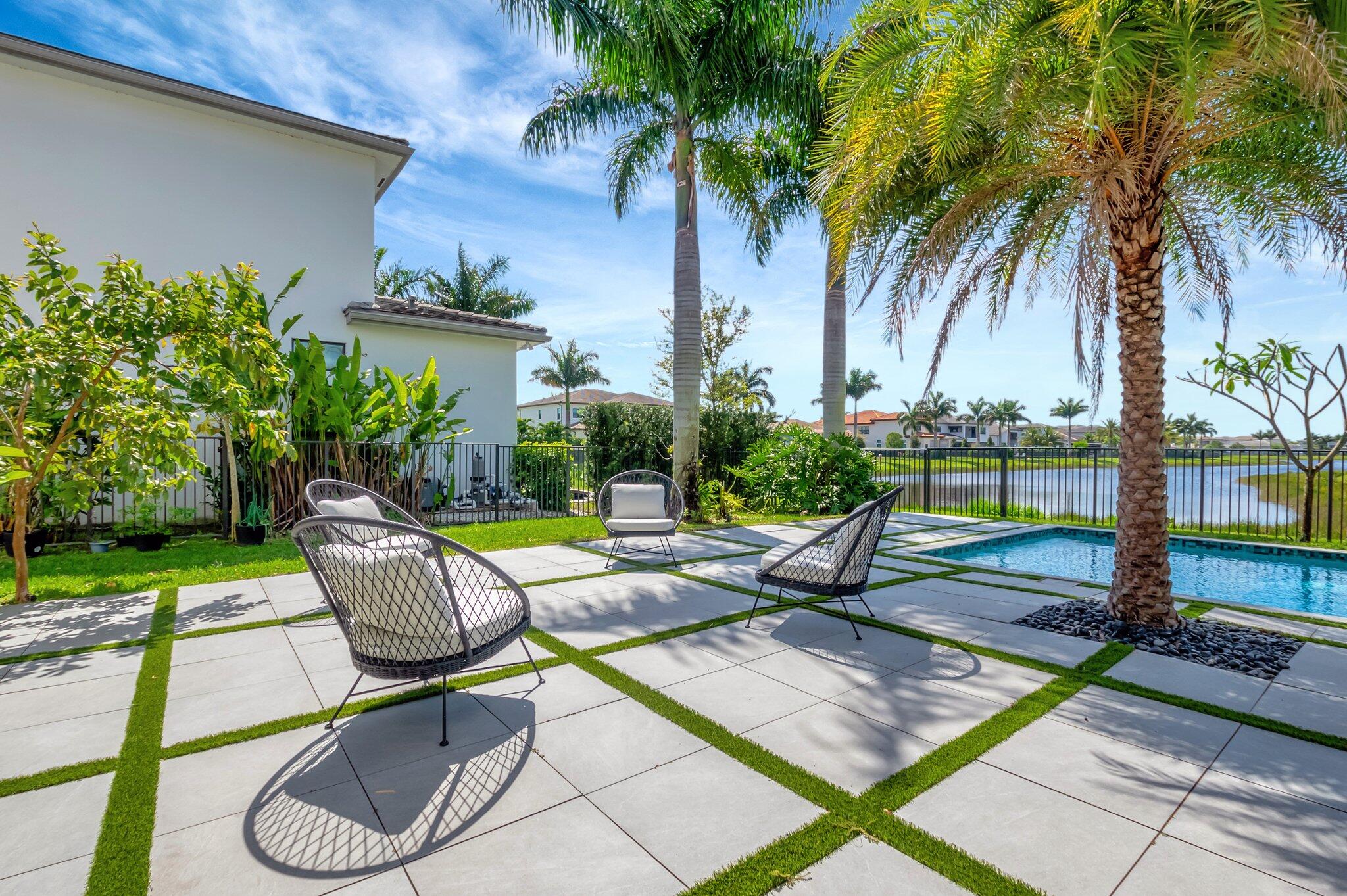 17353 Rosella Road Boca Raton, FL 33496 - Photo 67 of 103 a view of a patio with swimming pool