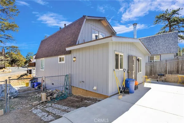 a front view of a house with patio