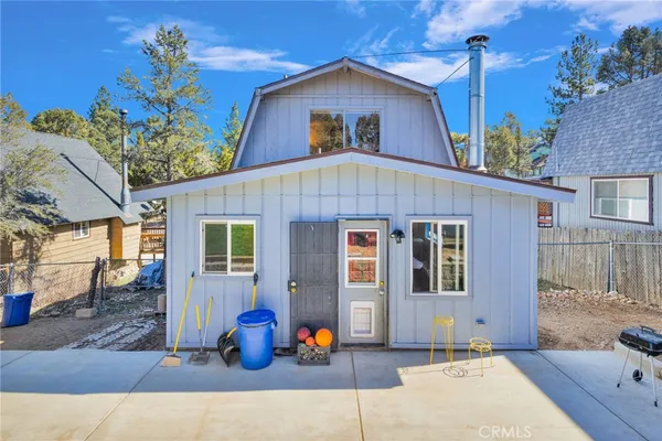 a front view of a house with patio