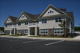 5 Corey Road, Unit 7 Poughquag, NY 12570 - Photo 1 of 1 a front view of a large white house