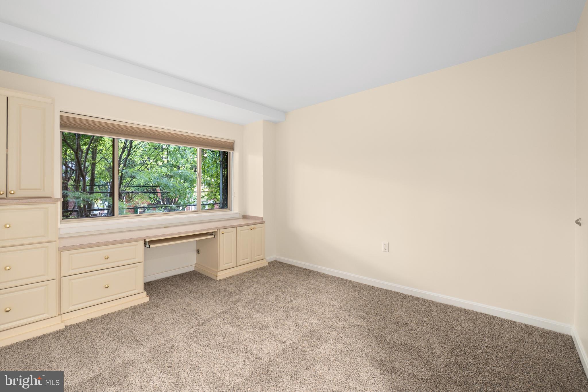 7981 Eastern Avenue Northwest, Unit 219 Silver Spring, MD 20910 - Photo 21 of 45 2nd bedroom with large window