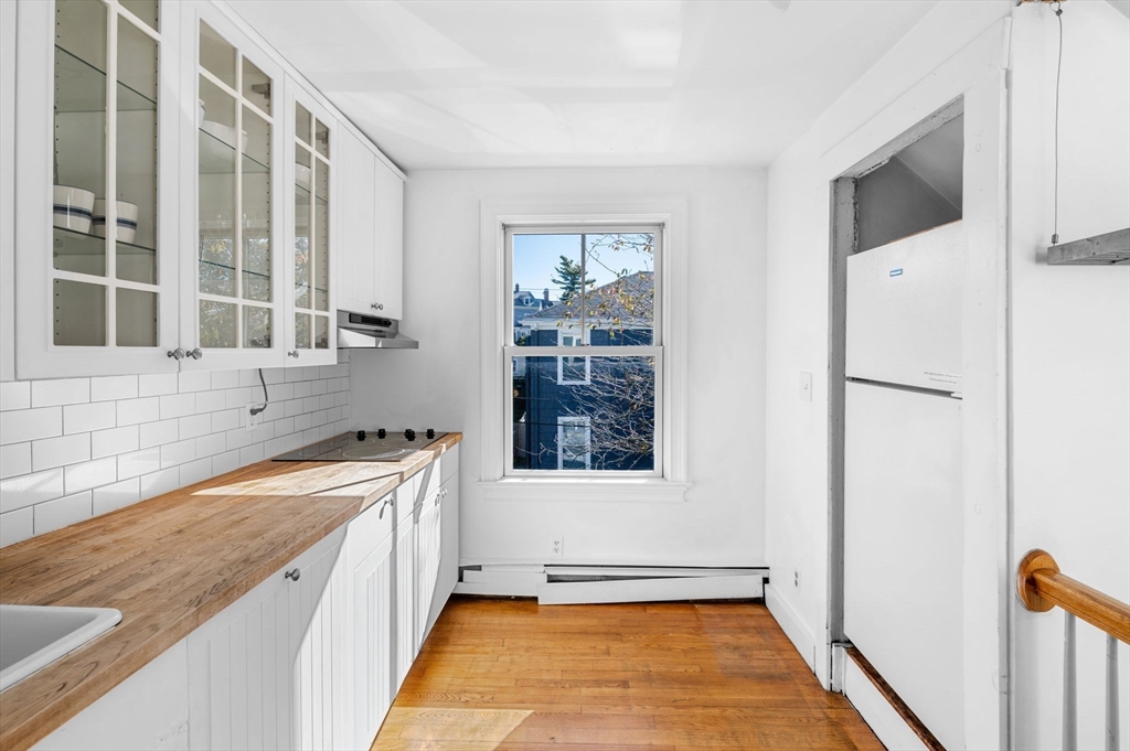 2 Lindsey Street Marblehead, MA 01945 - Photo 13 of 19 a view of a kitchen with a sink and a window