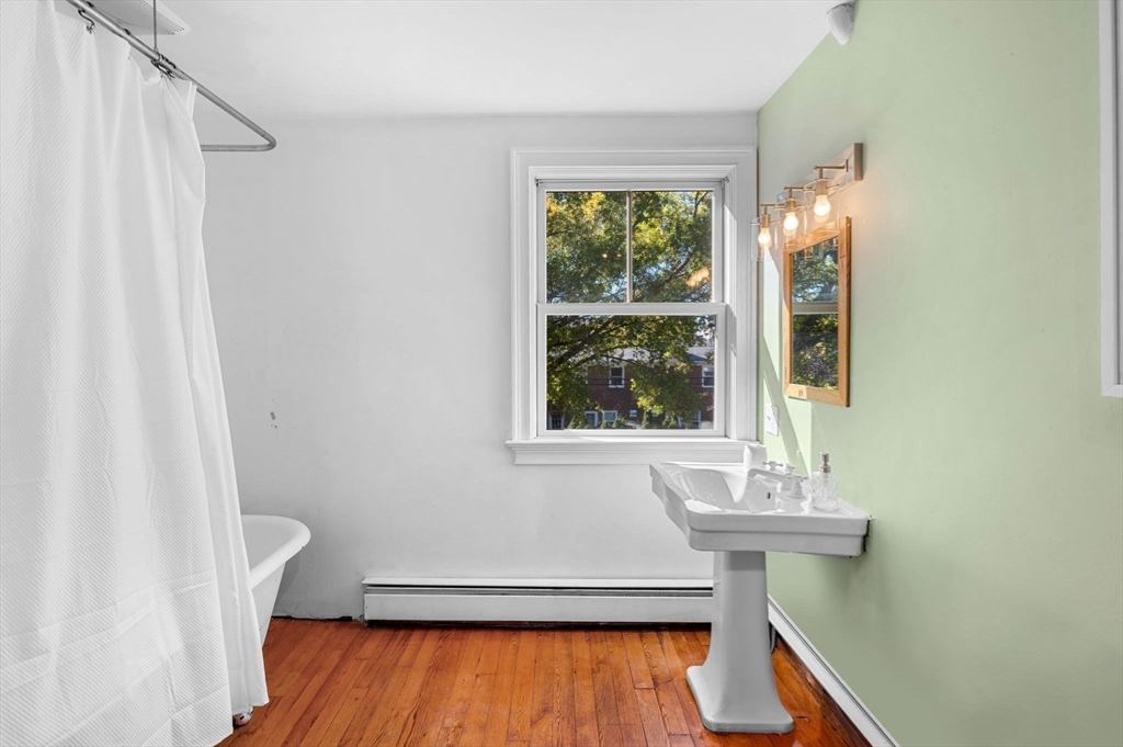 2 Lindsey Street Marblehead, MA 01945 - Photo 14 of 19 a bathroom with a sink a toilet and shower
