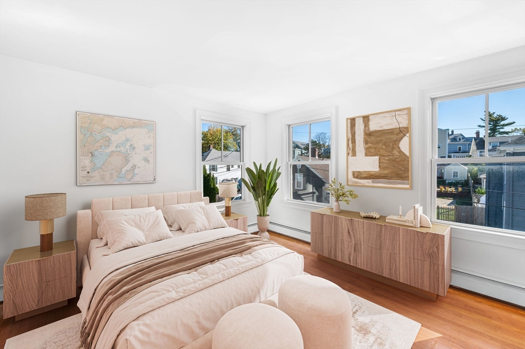 2 Lindsey Street Marblehead, MA 01945 - Photo 15 of 19 a bedroom with furniture and a large window