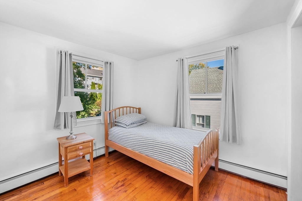 2 Lindsey Street Marblehead, MA 01945 - Photo 16 of 19 a bedroom with a bed and a window