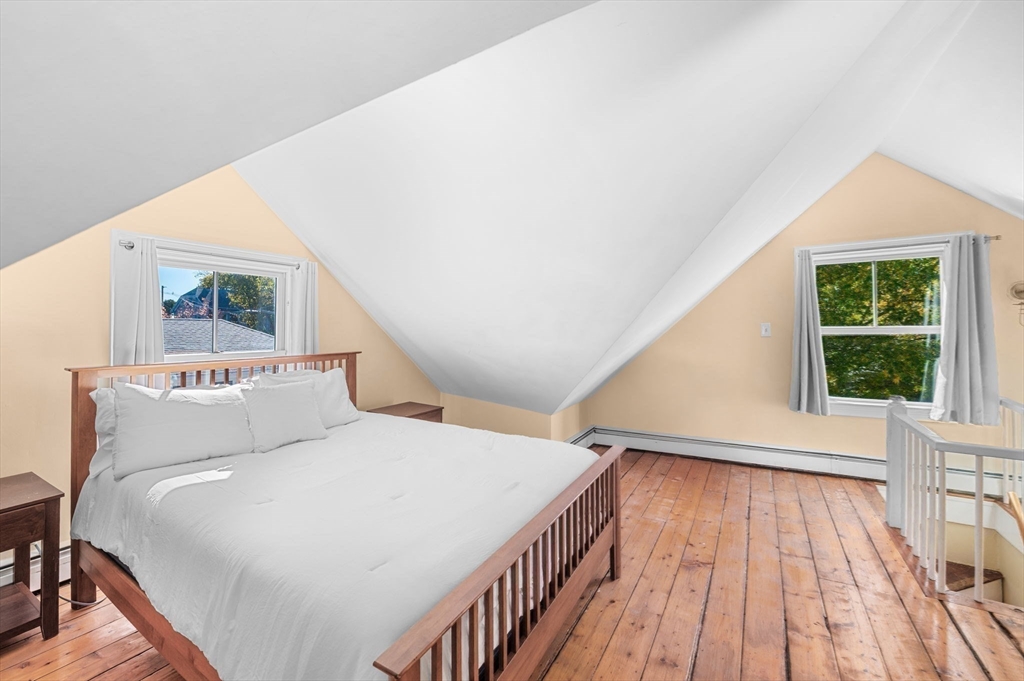 2 Lindsey Street Marblehead, MA 01945 - Photo 17 of 19 a bed room with a bed and a large window