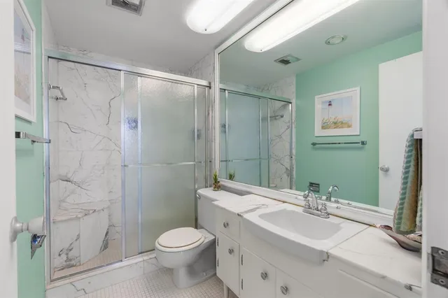 a room with gym equipment and a large window