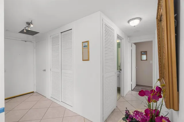 a living room with lots of furniture and a flat screen tv