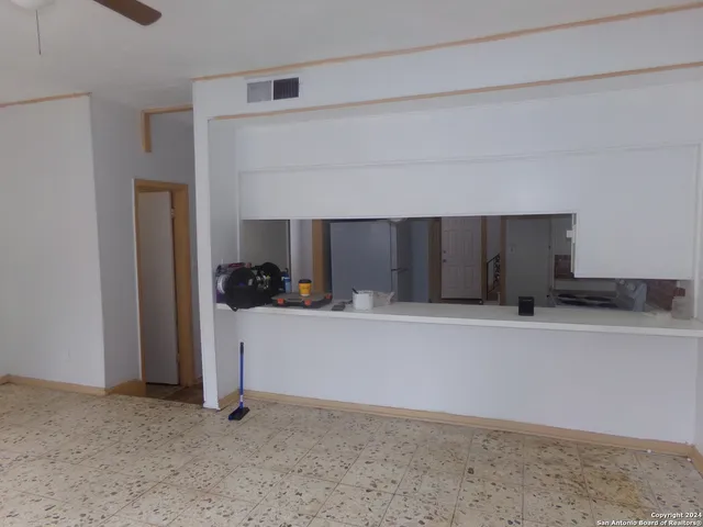 a view of kitchen and utility room