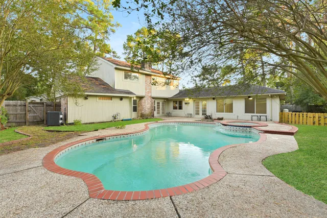 front view of a house with a swimming pool