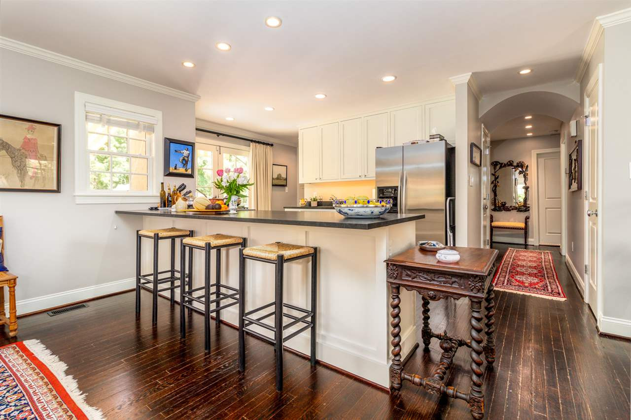 1321 Brooks Avenue Raleigh, NC 27607 - Photo 10 of 30 Used quite often with guests and family, the large island is a perfect gathering place when not using the dining room. Kitchen