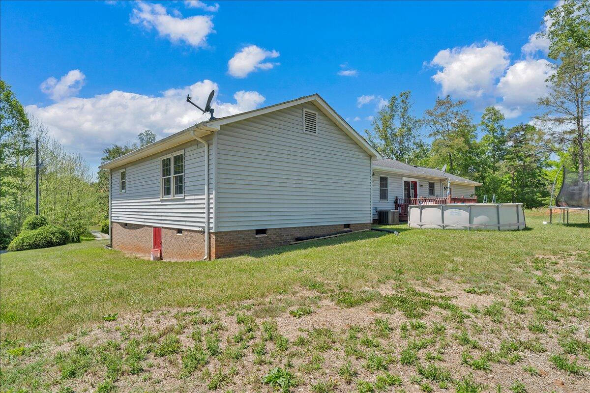 3870 Goose Dam Road Rocky Mount, VA 24151 - Photo 35 of 44 a backyard of a house with lots of green space