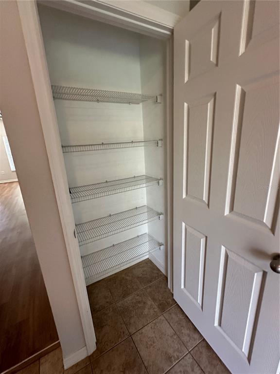 15816 Fishhawk View Drive Lithia, FL 33547 - Photo 10 of 30 a storage room with cabinets