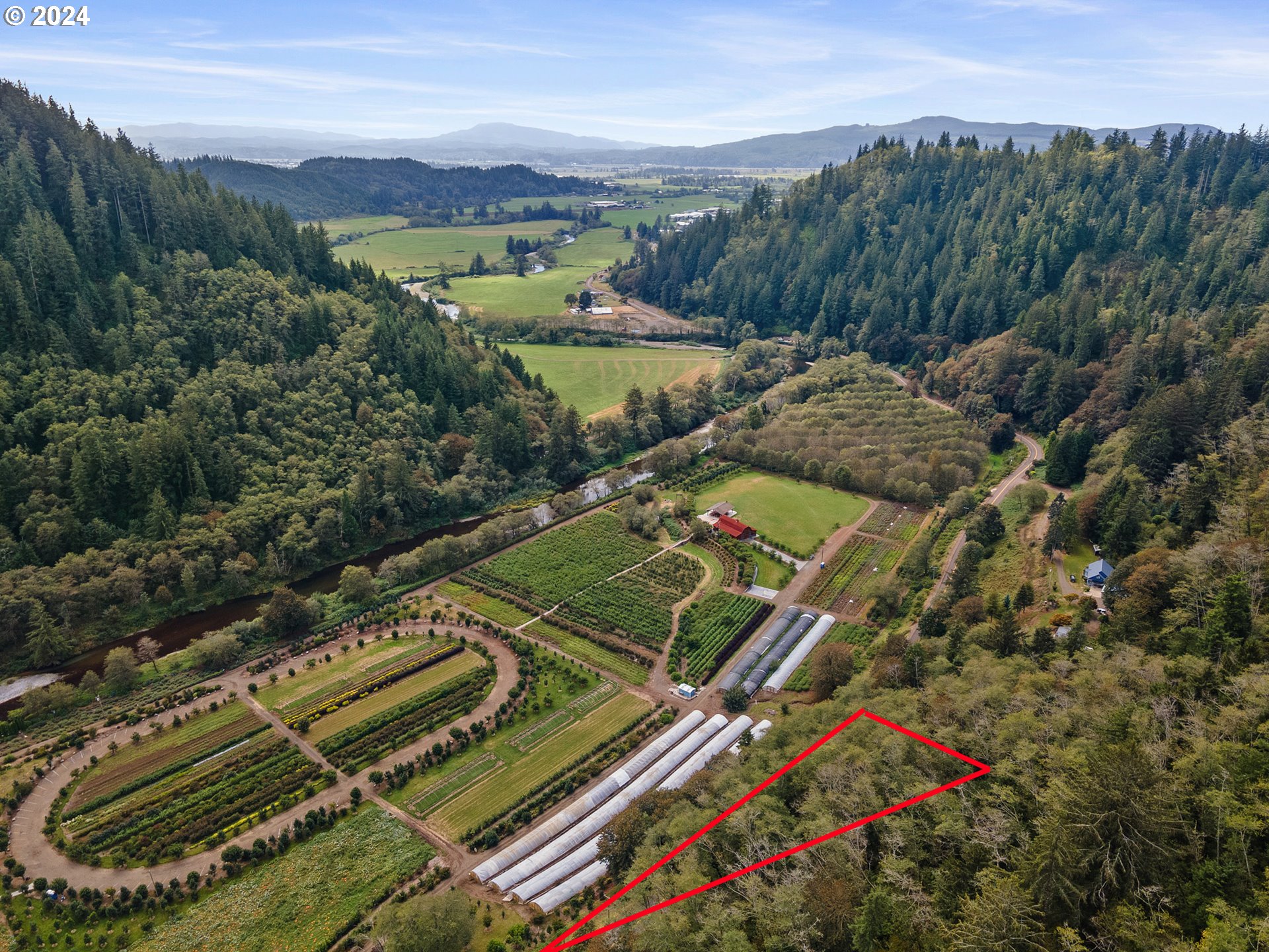 500 Kilchis River Tillamook, OR 97141 - Photo 14 of 15 a view of a tennis ground with a large park