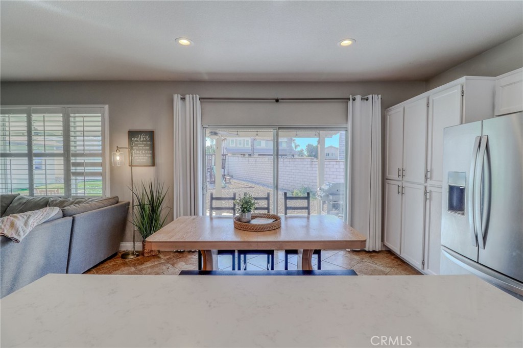 729 Windbound Avenue Beaumont, CA 92223 - Photo 26 of 73 a living room with furniture and a large window