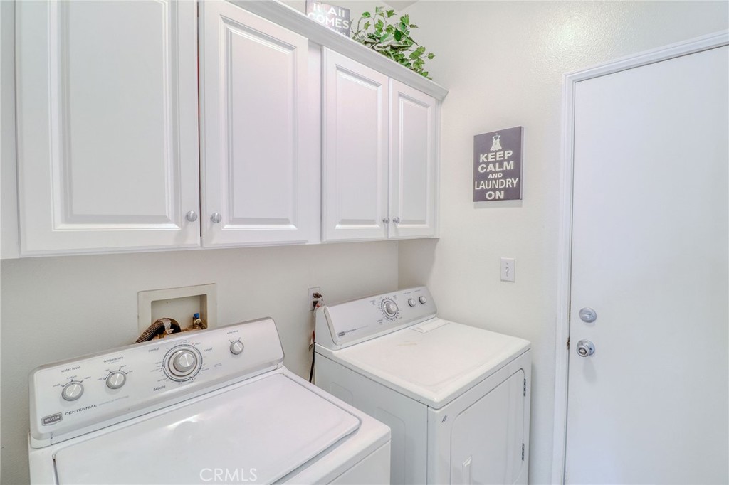 729 Windbound Avenue Beaumont, CA 92223 - Photo 48 of 73 a utility room with dryer and washer