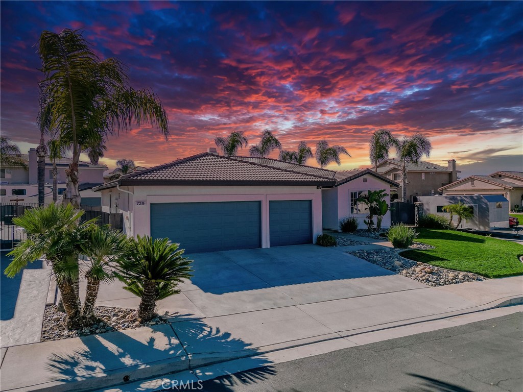 729 Windbound Avenue Beaumont, CA 92223 - Photo 5 of 73 front view of a house with a yard