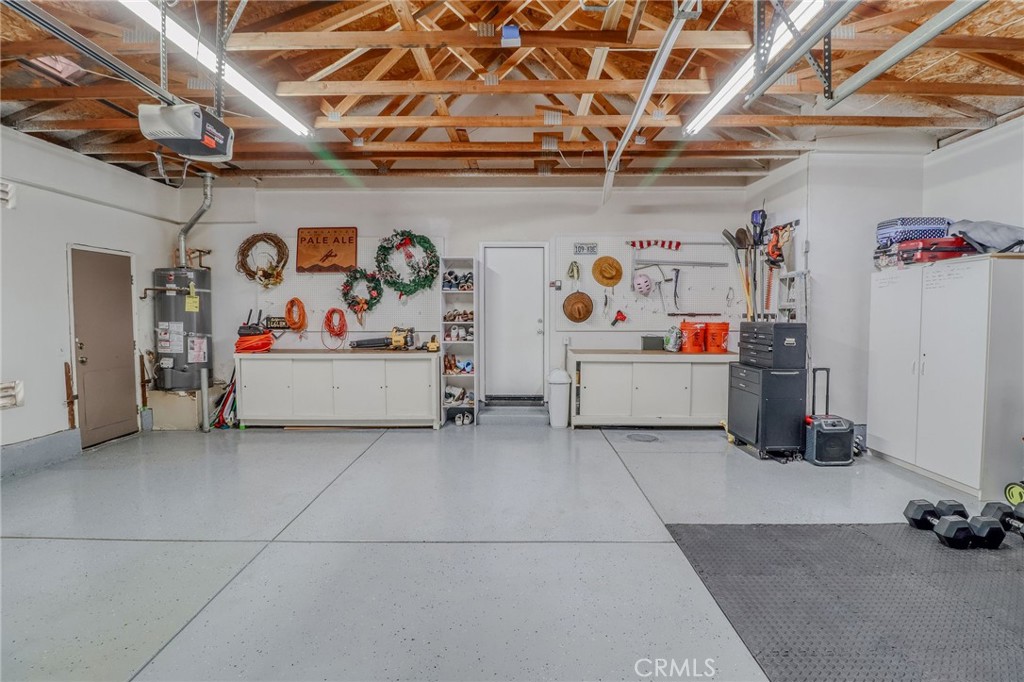 729 Windbound Avenue Beaumont, CA 92223 - Photo 51 of 73 a utility room with storage and a furniture