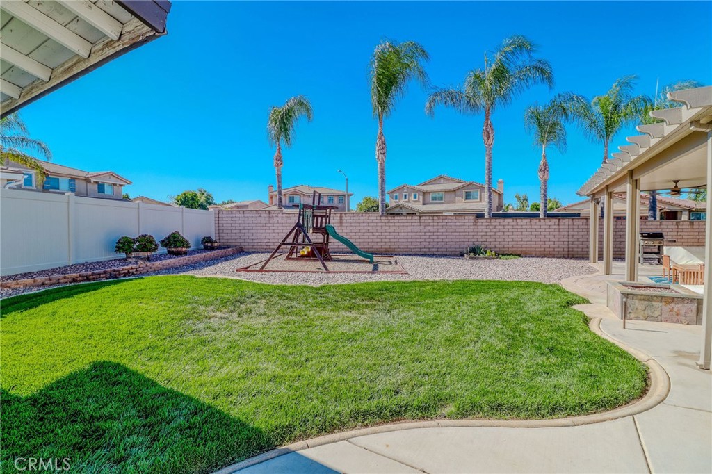 729 Windbound Avenue Beaumont, CA 92223 - Photo 63 of 73 a view of a backyard with a garden