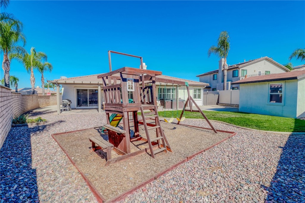 729 Windbound Avenue Beaumont, CA 92223 - Photo 67 of 73 a view of a house with a yard