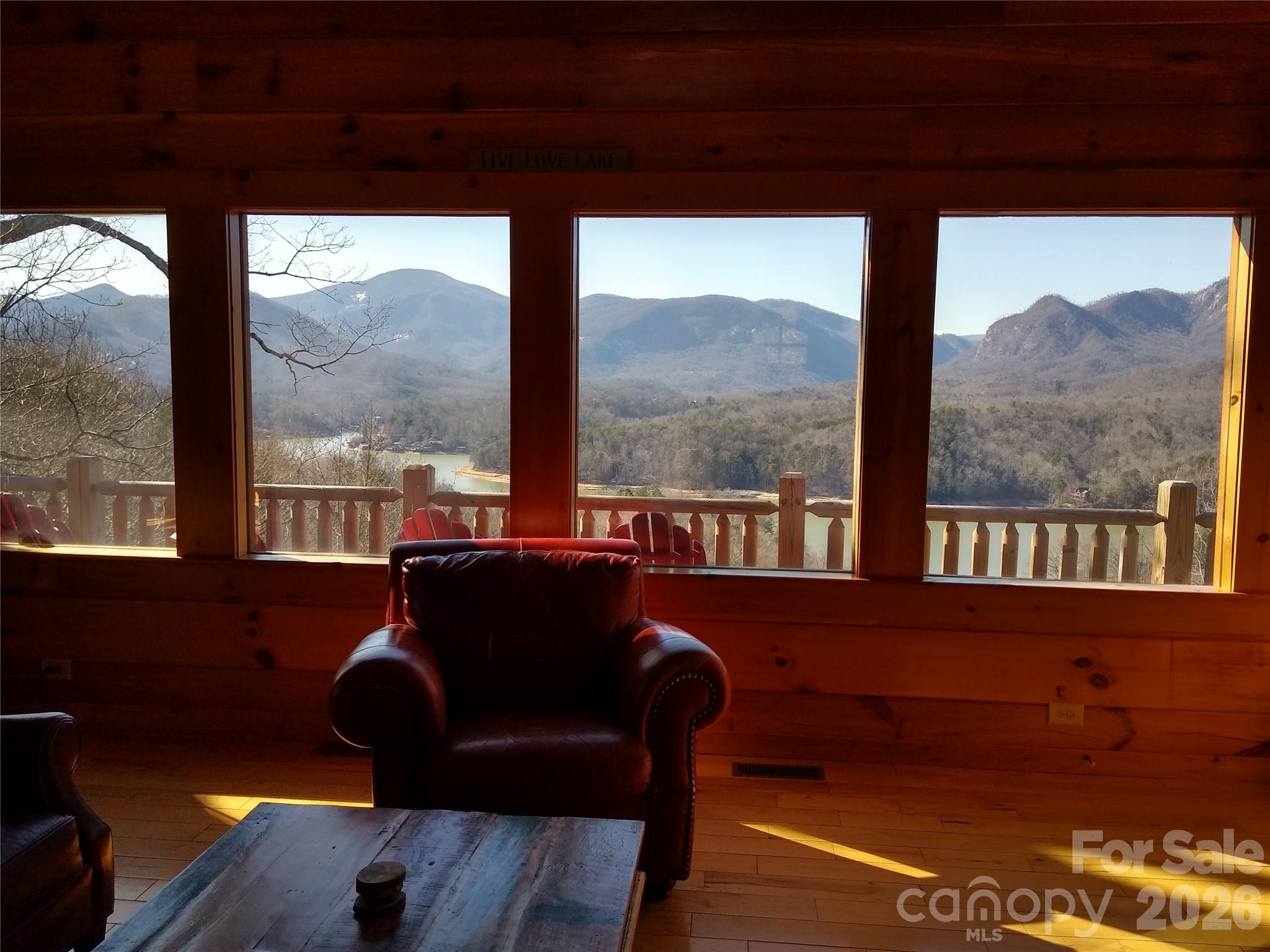 169 Overlook Point Lane Lake Lure, NC 28746 - Photo 13 of 39 a view of a living room and a window