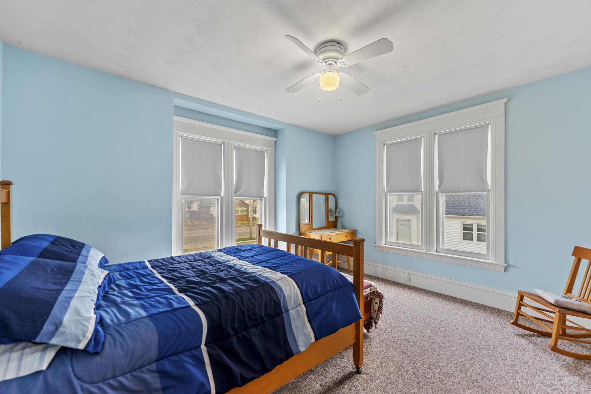 1111 Pearl Street Belvidere, IL 61008 - Photo 12 of 40 a bedroom with a bed and window