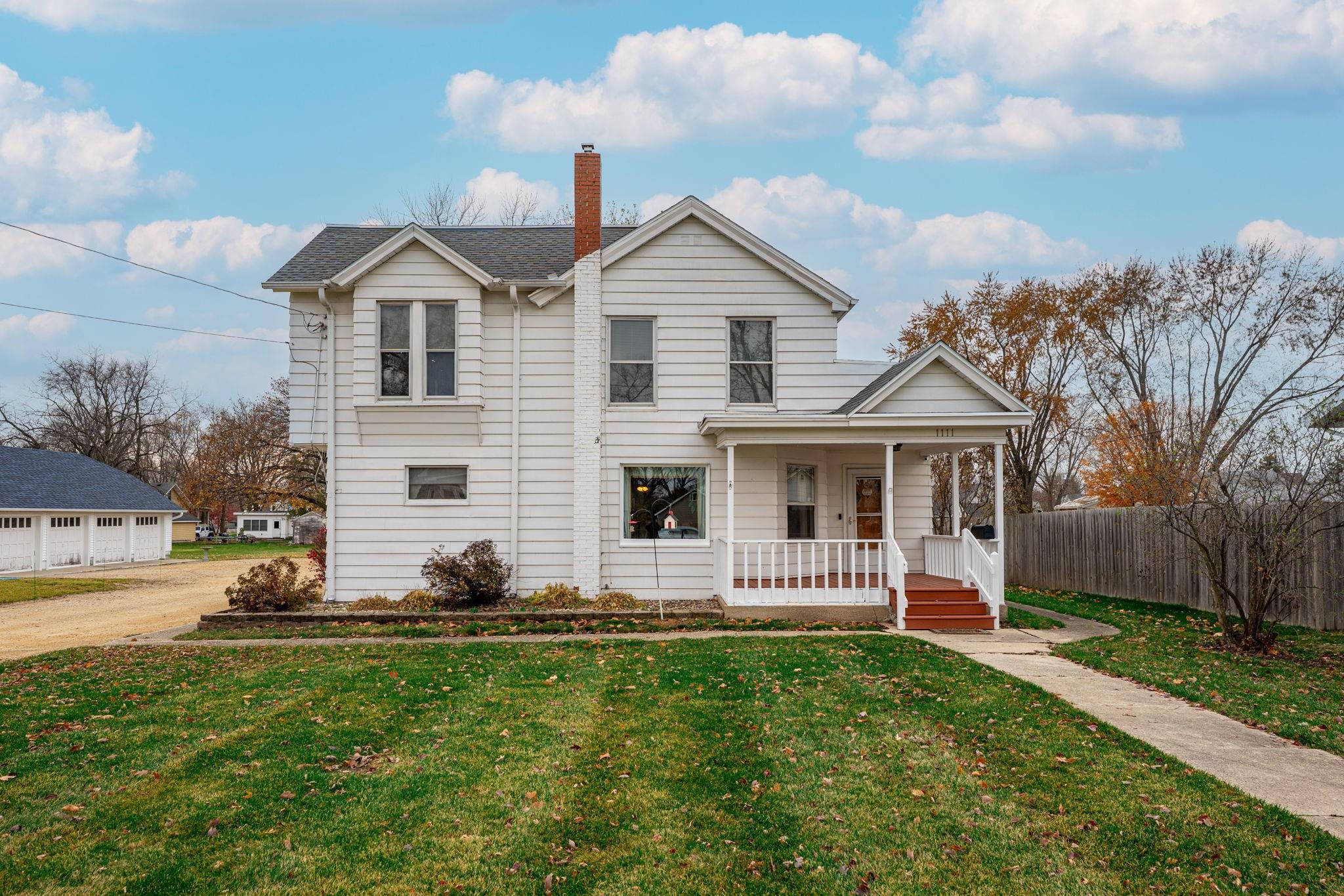 1111 Pearl Street Belvidere, IL 61008 - Photo 19 of 40 a front view of a house with a yard