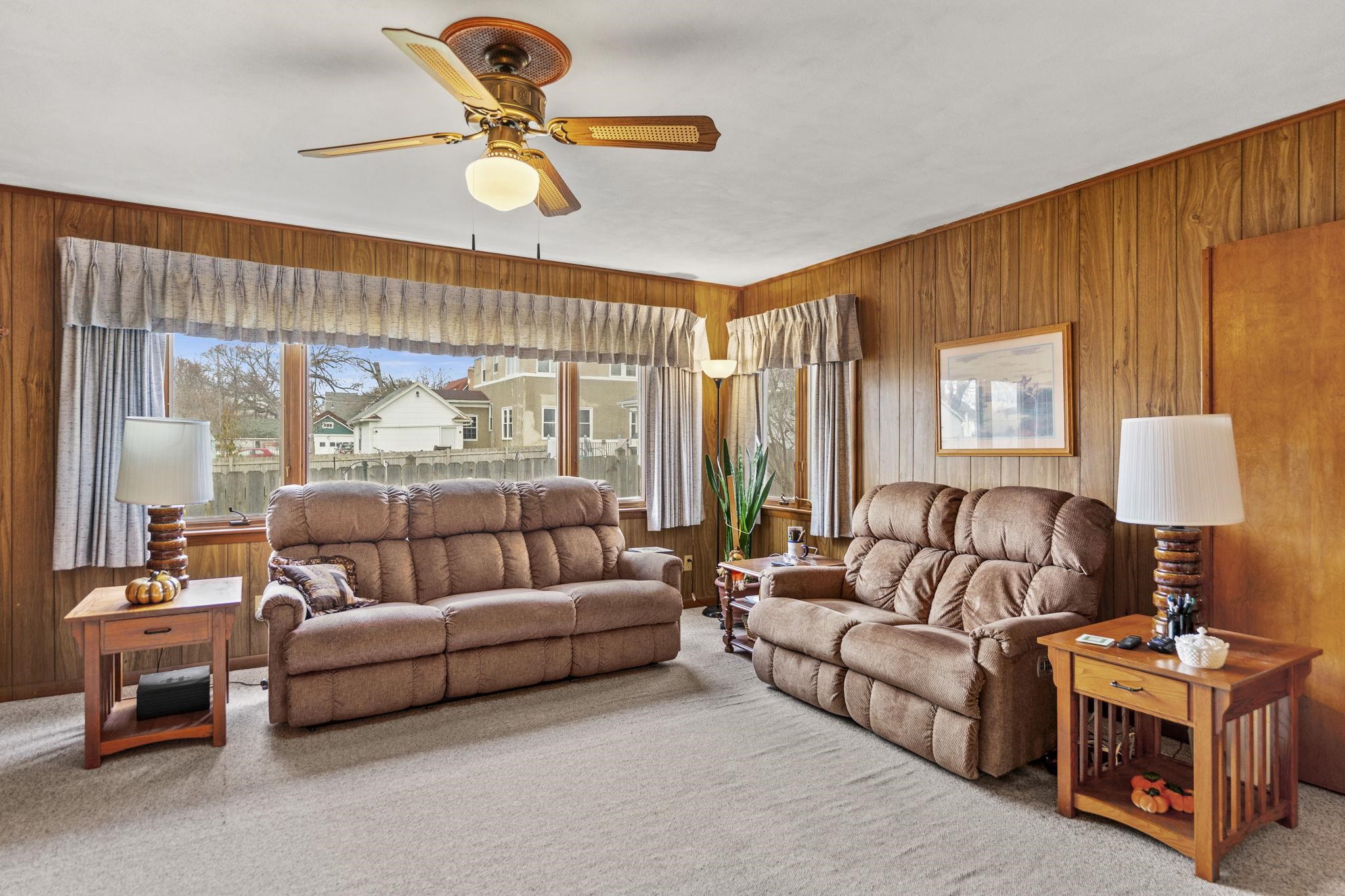 1111 Pearl Street Belvidere, IL 61008 - Photo 24 of 40 a living room with furniture and a large window