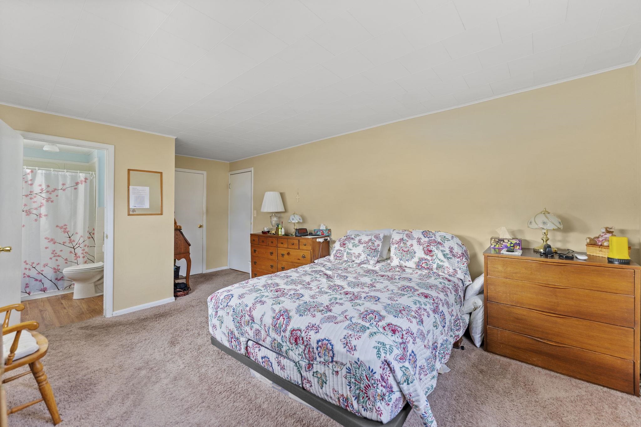 1111 Pearl Street Belvidere, IL 61008 - Photo 31 of 40 a bedroom with a bed and a cabinets