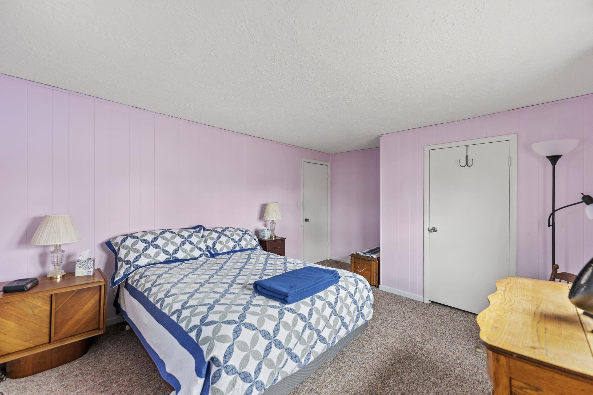 1111 Pearl Street Belvidere, IL 61008 - Photo 10 of 40 a bedroom with a bed and a window