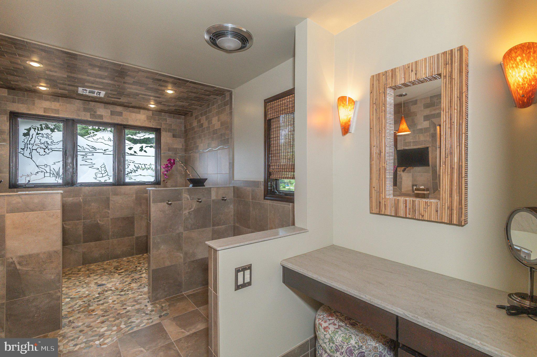 434 4th Street Atco, NJ 08004 - Photo 48 of 69 a bathroom with a sink a mirror and a toilet