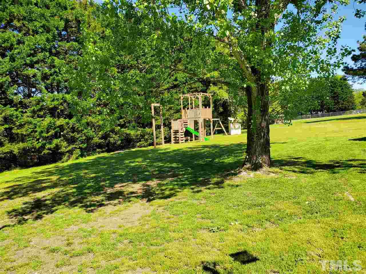 7018 Kiger Road Rougemont, NC 27572 - Photo 3 of 3 a view of a trees with a yard