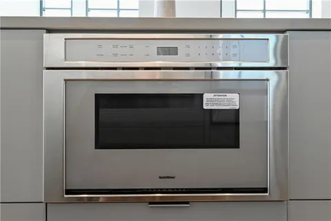 a bathroom with a sink and a window