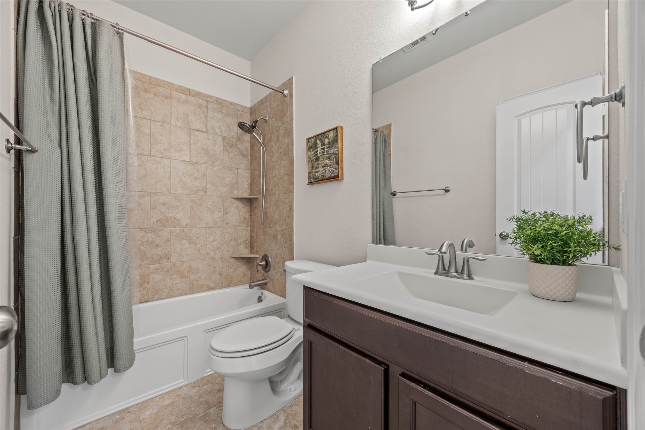 536 Rancho Verde Drive Leander, TX 78641 - Photo 23 of 37 a bathroom with a sink a toilet and shower