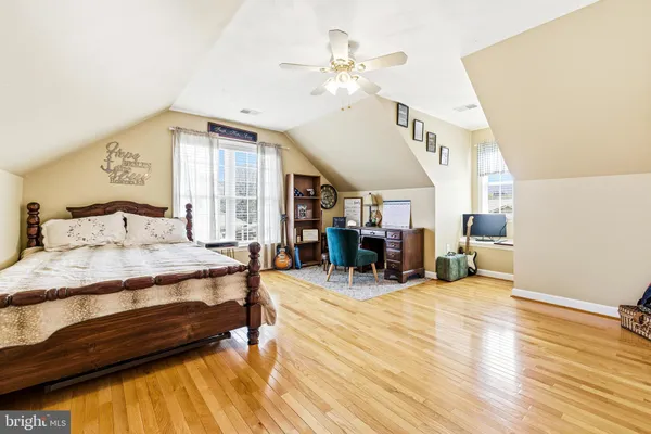 a room with furniture and a wooden floor
