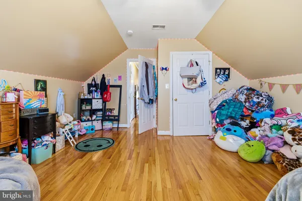 a view of storage and utility room with washer and dryer