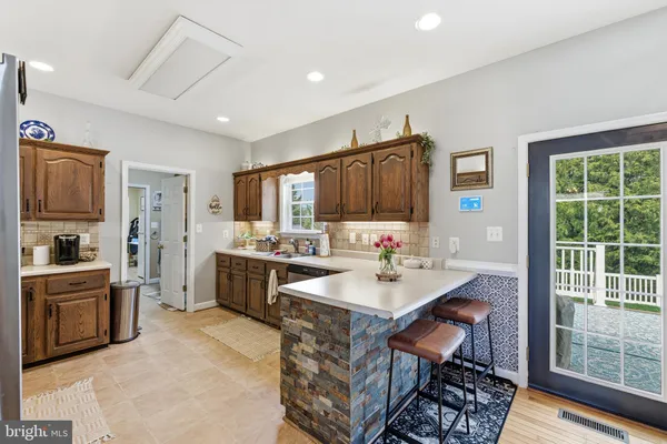 a open kitchen with sink cabinets and stainless steel appliances