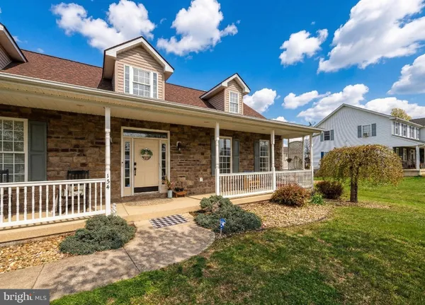 a house view with a garden space