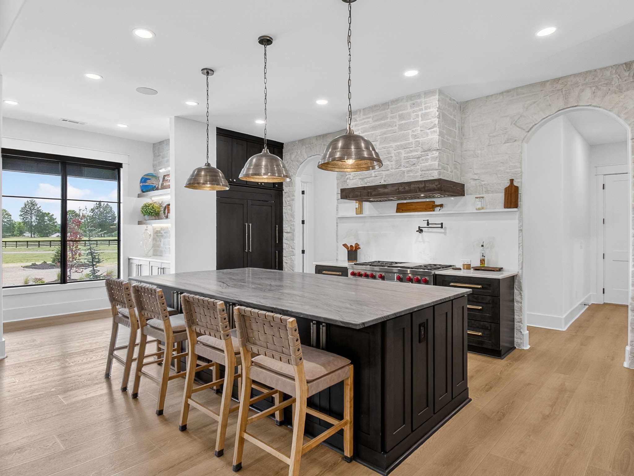 5710 Lunns Store Road Chapel Hill, TN 37034 - Photo 27 of 99 a kitchen with a table chairs stove and wooden floor