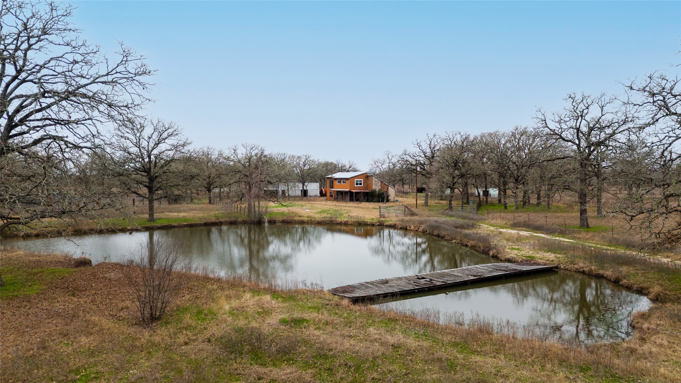 a view of a lake with houses with outdoor space