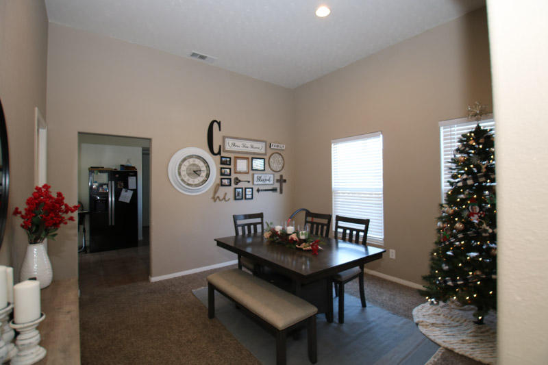 1127 K Street Reedley, CA 93654 - Photo 7 of 22 a view of a workspace with furniture