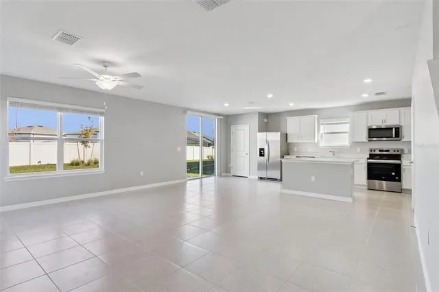 a view of kitchen with furniture and window