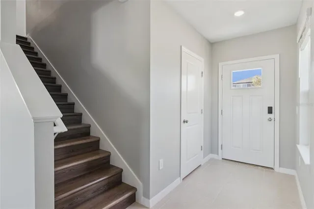 a view of an entryway with staircase